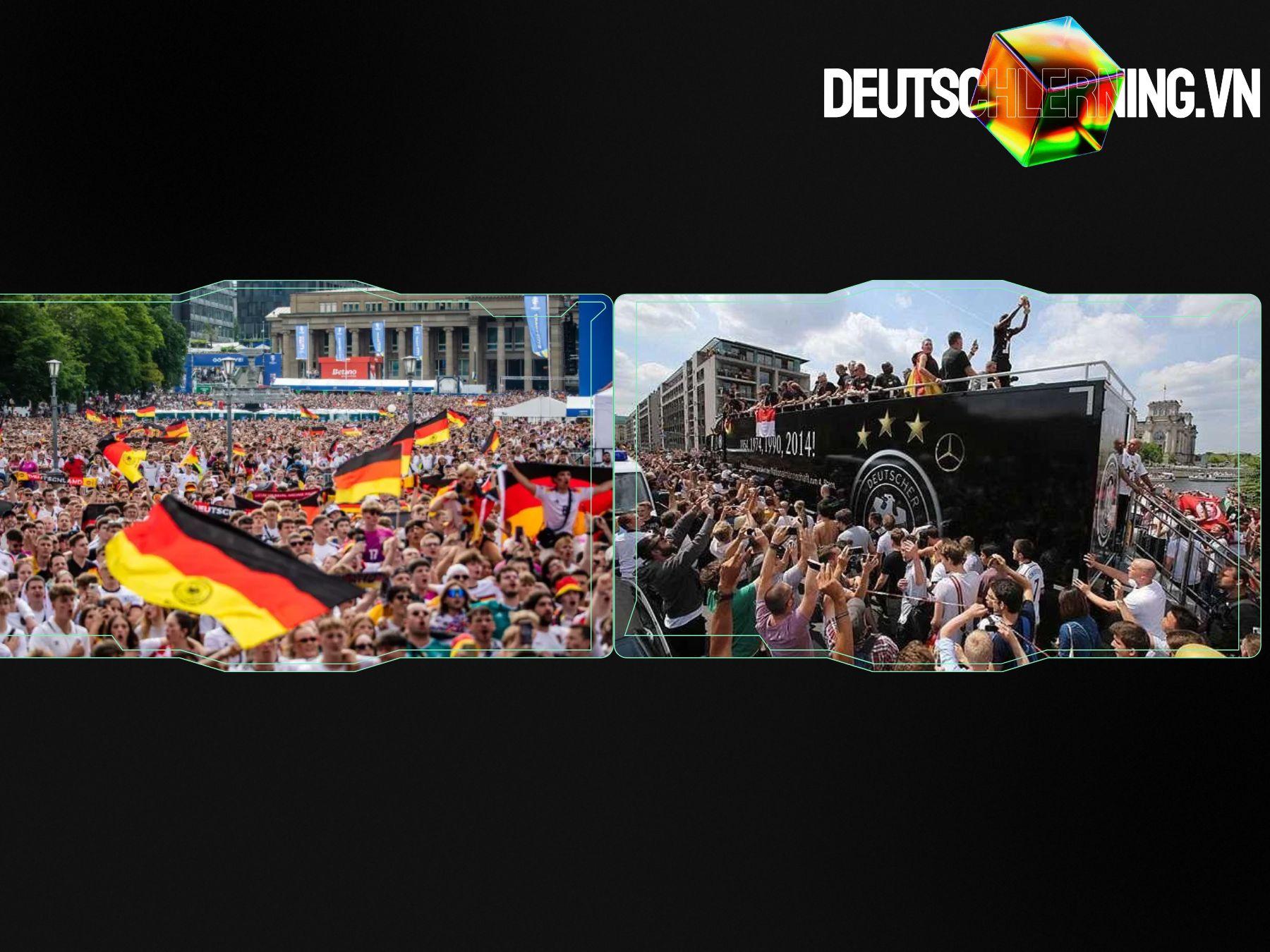 CĐV Đức ăn mừng trên khán đài với lá cờ quốc gia.